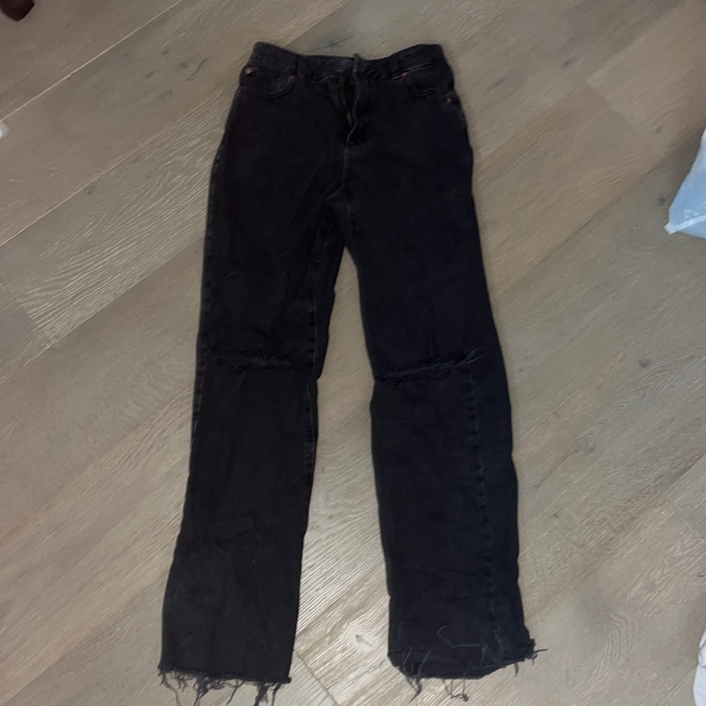 Garage wide jeans with rips on the knees